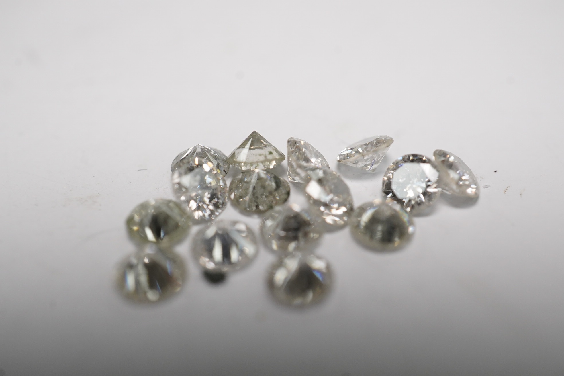 A small group of unmounted round brilliant cut diamonds, weighing approximately 2.12ct. Condition - fair to good